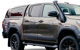 Toyota Hilux Pickup by Ullstein Concepts with Canopy TL-1 and TJM Snorkel
