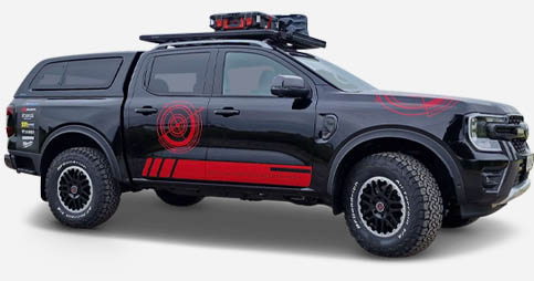 Ford Ranger Raptor offroad conversion with front bar with cross tube in black, TL1 hardtop, winch and mounting kit and Strands Night Ranger auxiliary headlights. 